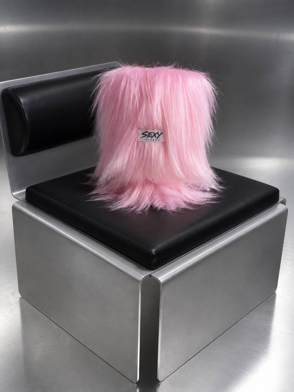 Pink SEXY FLASH lamp on a chrome chair