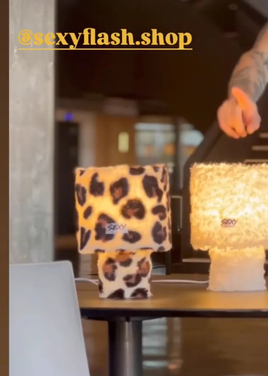 Leopard and white SEXY FLASH lamps shared by a customer in Los Angeles